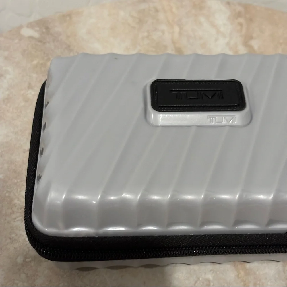 Tumi hard suitcase style cosmetic case